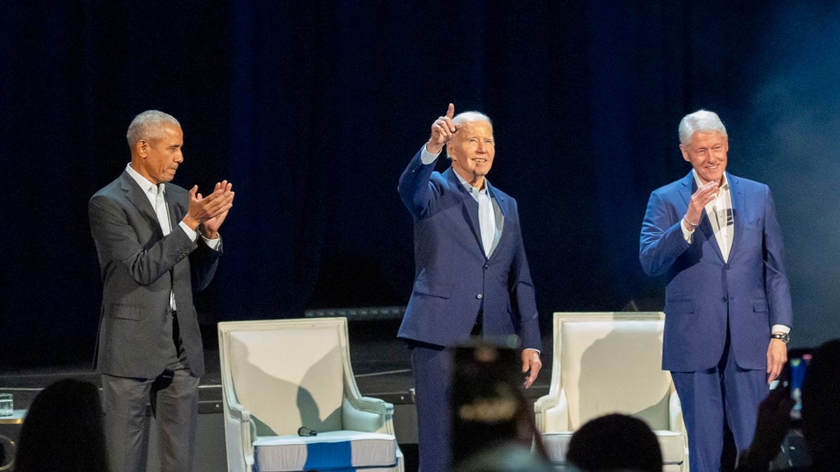 Biden, Clinton and Obama at campaign fundraiser on stage