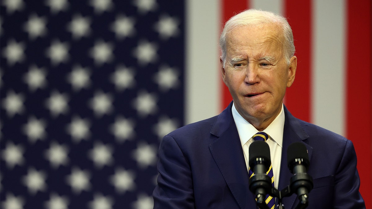 President Biden in front of an American flag