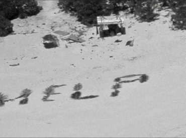 US Coast Guard, Navy rescue 3 fishermen from deserted island after spelling 'HELP' with palms