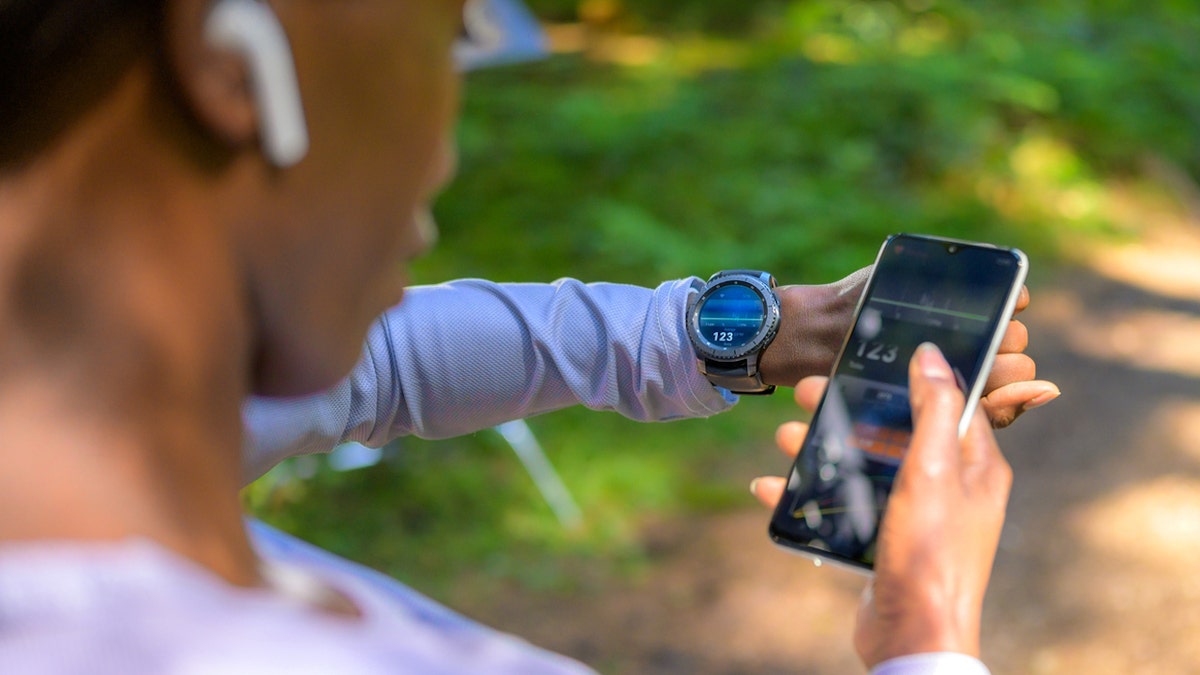 Runner with smartwatch