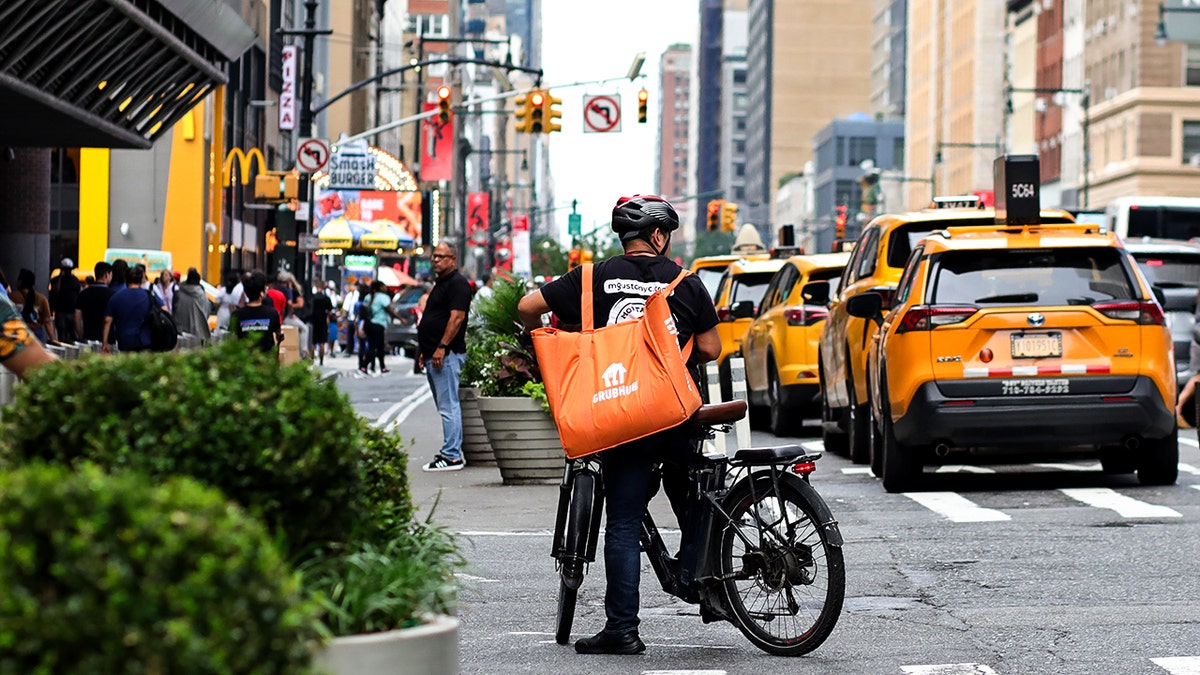 Man delivering Grubhub.