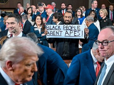 Al Green ejected from Trump primetime address again — this time with protest sign