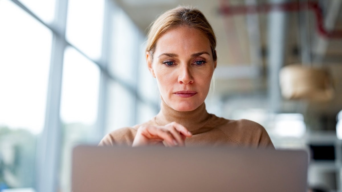Woman on computer doing brain training session