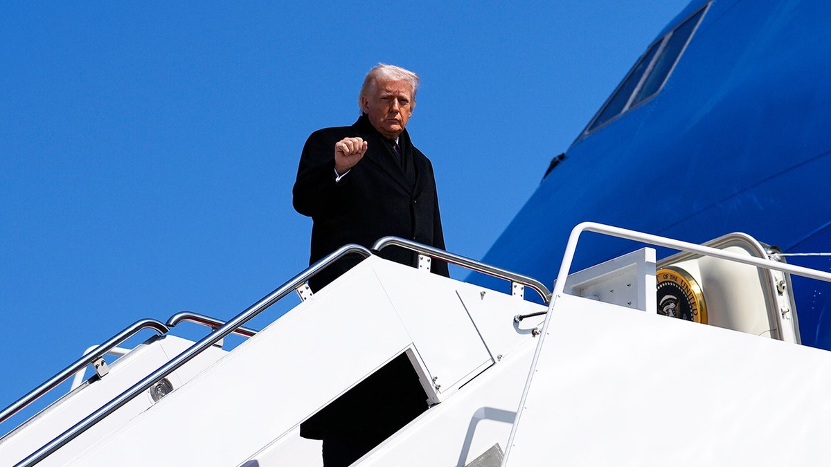 President Donald Trump boarding Air Force One at Joint Base Andrews.