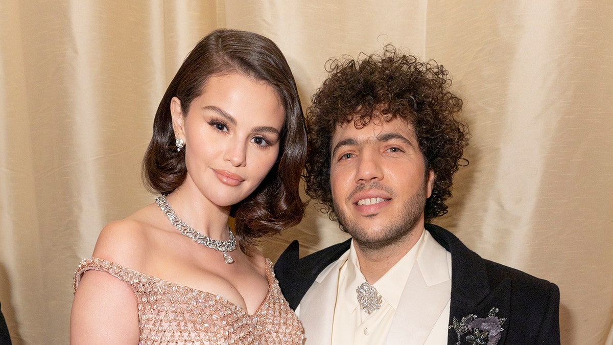 Selena Gomez wears strapless sparkling gown with fiance benny blanco in white suit