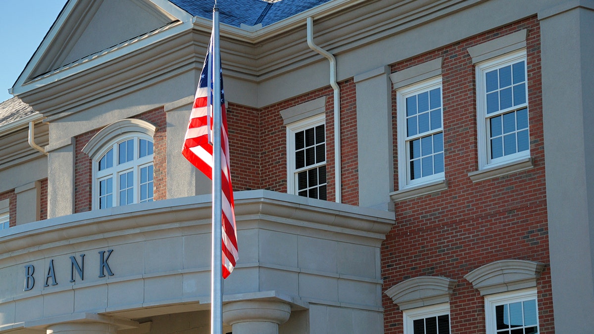 The exterior of a bank building is shown.